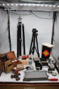 A quantity of Photographic items including a folding Polaroid SX-70 Sonar autofocus instant land