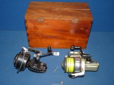 Two sea fishing reels : Daiwa Long Cast Spin reel 6000B and Garcia 'Mitchell 386' (used condition)