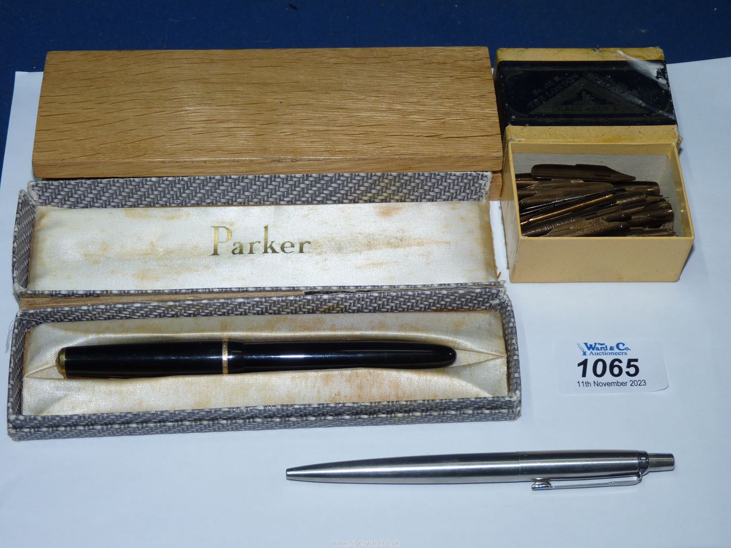 Two boxed Parker pens and a box of nibs.