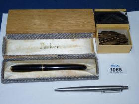 Two boxed Parker pens and a box of nibs.