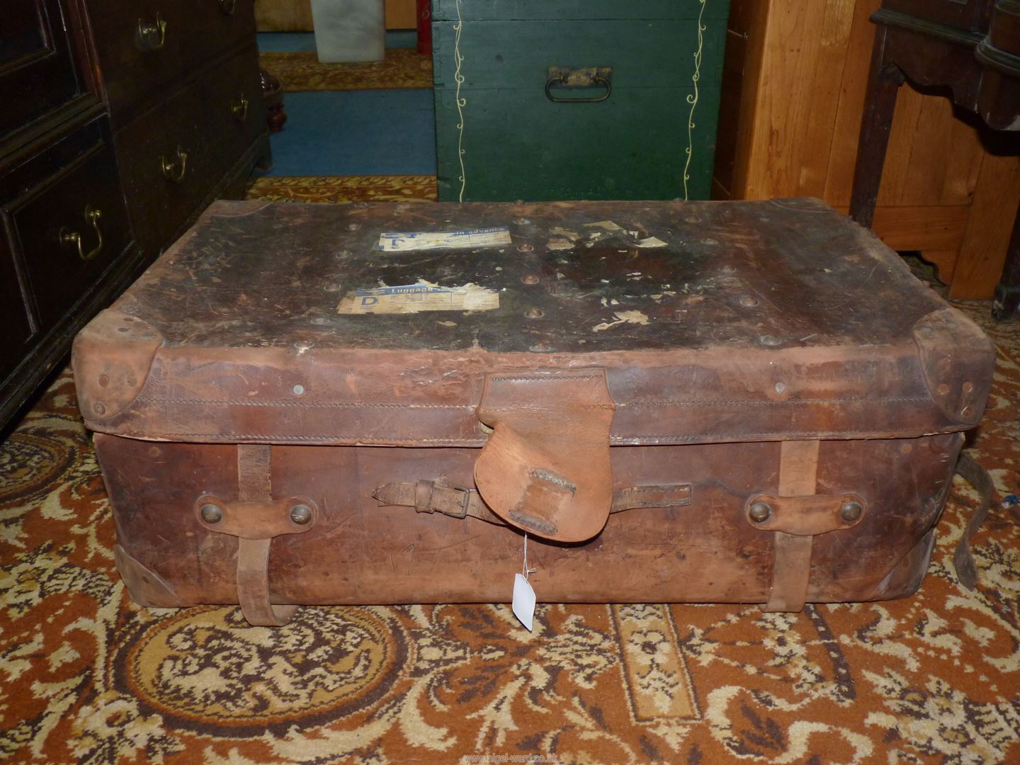 A brown leather suitcase marked 'Junior Army & Navy Ltd' with remnants of railway labels, - Image 4 of 5