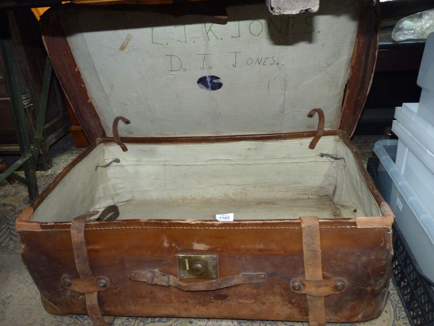 A brown leather suitcase marked 'Junior Army & Navy Ltd' with remnants of railway labels, - Image 2 of 5