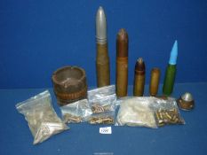 A quantity of military shells (various sizes), dummy shell, nose, paperweight etc.