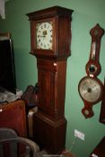 An Oak and Mahogany cased longcase / grandfather clock having light and dark-wood stringing,