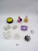 A Caithness ring stand (C34874) and a glass paperweight having yellow flower,