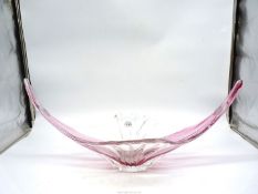 A large unmarked pink and clear glass centre piece/vase.