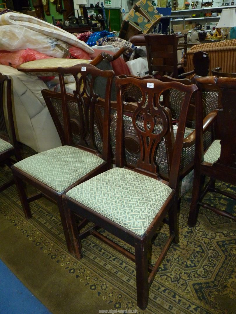 A pair of classic Georgian design Mahogany side/dining chairs having intricately fretworked back