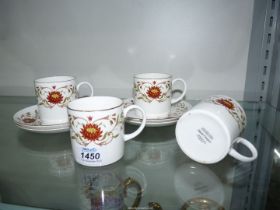 Four Susie Cooper 'Marisposa' coffee cans and saucers.