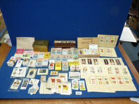 A quantity of Cigarette card sets and part sets to include Royalty, 1930s film acotors, motor car,