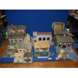 A home made Farmyard with animals including lead, plastic, Britains etc, well loved.