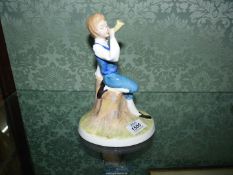 A Royal Doulton 'Nursery Rhyme Collection' figure titled 'Little Boy Blue',