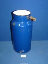 A vintage blue and white enamelled hand carry milk churn probably holding about a gallon in volume,