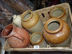 A quantity of stoneware including preserve jars, terracotta jug etc, some a/f.