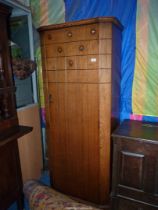A medium Oak single Wardrobe/hall cloaks Cupboard having studded detail to the door,