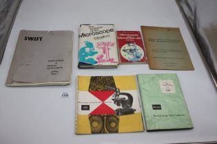 A quantity of books including "The Evolution of the Microscope" by S.