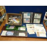 A quantity of First Day Covers, loose and in albums to include Japan, United States, Germany,