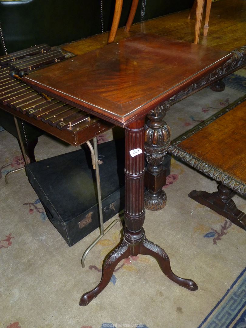 A surprisingly heavy Pedestal Music Stand/Lectern having a Cuban Mahogany rectangular top,