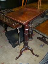 A surprisingly heavy Pedestal Music Stand/Lectern having a Cuban Mahogany rectangular top,