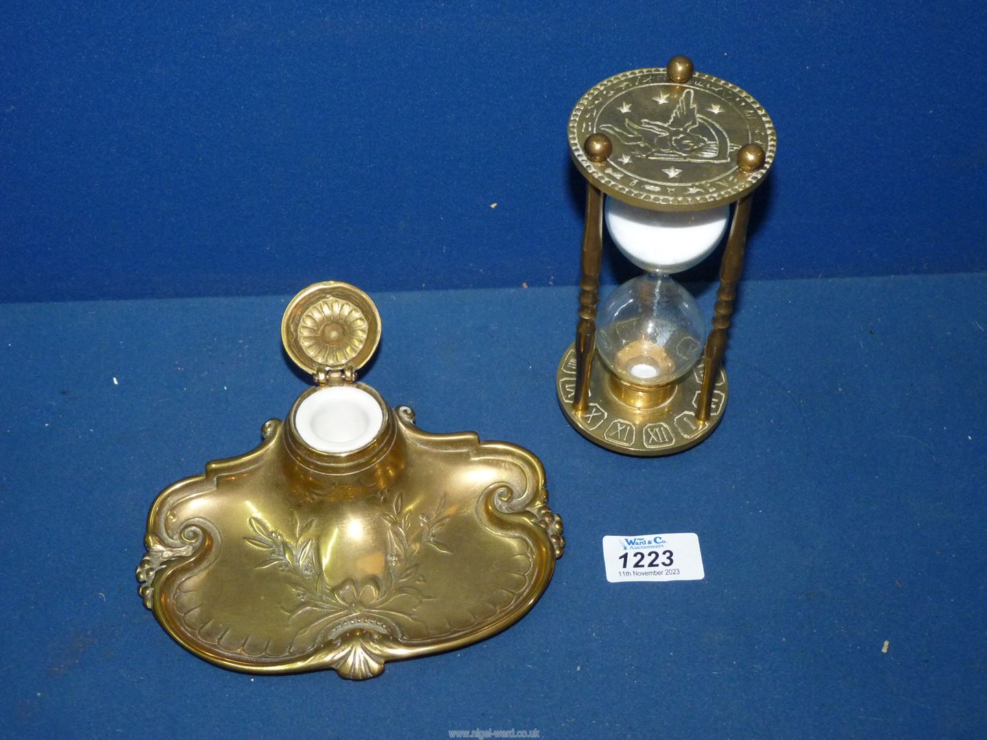 An Art Nouveau brass inkwell with holly decoration and bow, china inkwell present, - Image 2 of 2