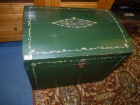 A domed top Pine Trunk painted green with cream and floral details,