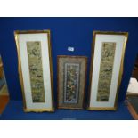 Three pictures of embroidery on silk with birds and butterflies in ornate frames,