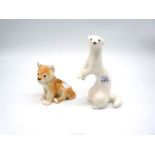 Two USSR figures; lion and stoat.