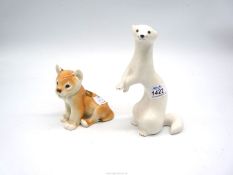 Two USSR figures; lion and stoat.