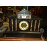 A large 19th century slate mantel Clock in classical style inlaid with vertical variegated marble