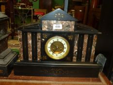 A large 19th century slate mantel Clock in classical style inlaid with vertical variegated marble