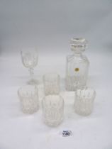 A Decanter and four matching cut glass tumblers (one a/f.), plus a crystal wine glass.