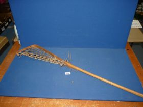 A Lacrosse stick.