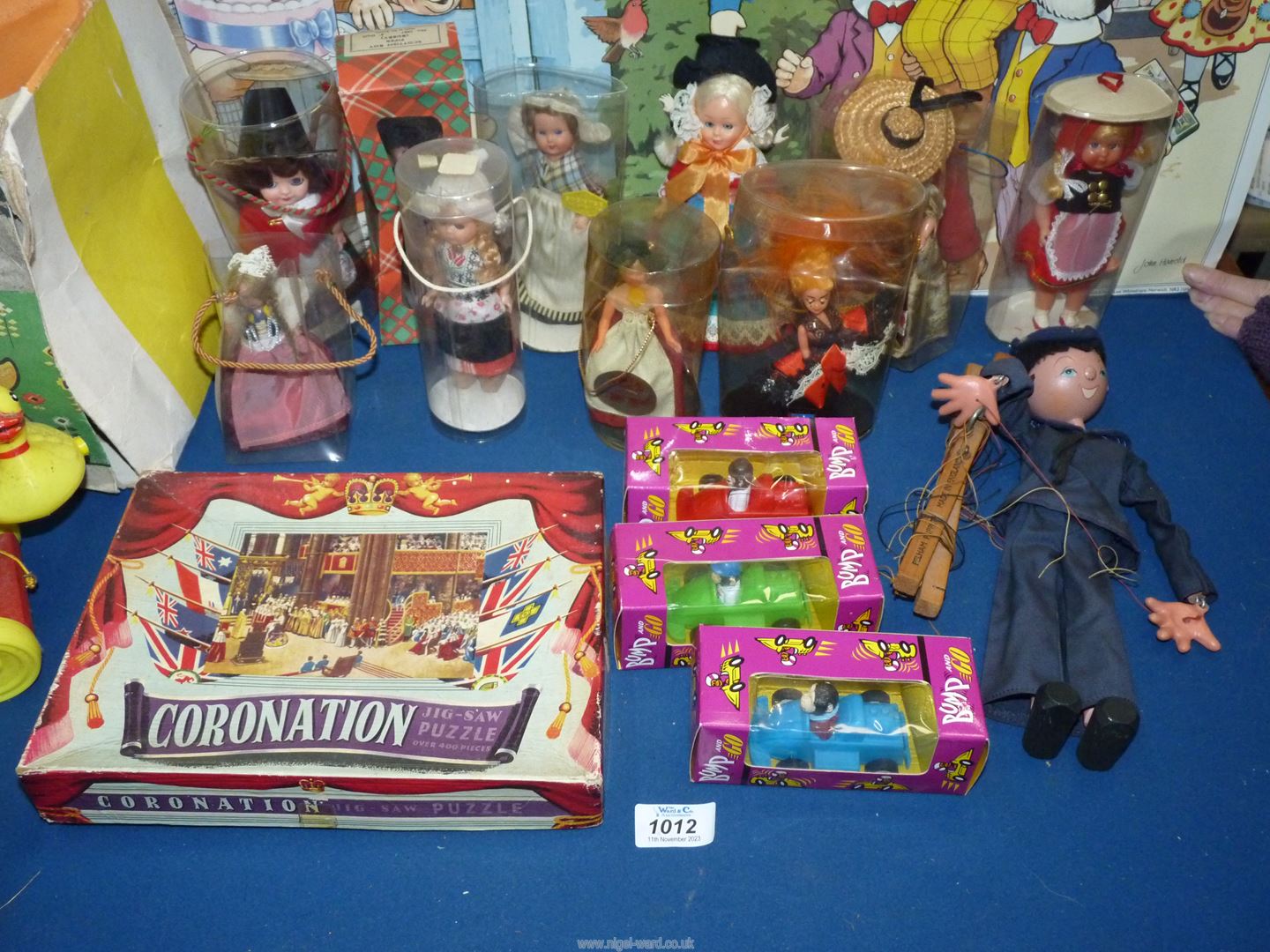 A quantity of miscellanea to include; child's vintage pull-along duck, Souvenir dolls, - Image 2 of 2