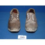 A pair of children's leather Lancashire clogs, possibly Victorian.