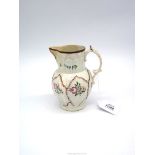 An English Staffordshire Pottery 'Cabbage leaf' moulded jug, circa 1800, spout restored, 6" tall.