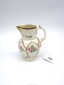 An English Staffordshire Pottery 'Cabbage leaf' moulded jug, circa 1800, spout restored, 6" tall.