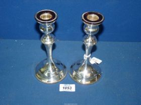 A pair of early 20th century unusual silver Art Nouveau candlesticks with wide tortoiseshell rim to