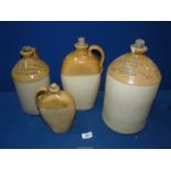 Four stoneware flagons including 'T.H Pritchard Mineral Water, Abertillery'and 'N.