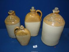 Four stoneware flagons including 'T.H Pritchard Mineral Water, Abertillery'and 'N.