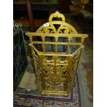 A gold painted cast iron Stick/umbrella Stand decorated with floral swags, foliage, etc.