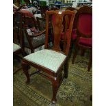 A satinwood framed side Chair of Queen Anne flavour standing on cabriole front legs united by a
