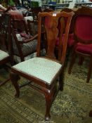 A satinwood framed side Chair of Queen Anne flavour standing on cabriole front legs united by a
