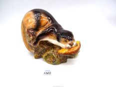 A Sylvac hand painted Otter with a fish in its mouth, no. 5459, 10" wide x 7" high.