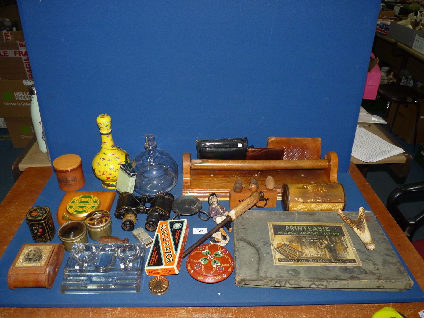 A box of miscellanea including a Chinese lidded vase, leather goods, treen, novelty items, etc.