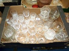A quantity of cut glass to include; jugs, brandy glasses, wine glasses,
