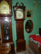 A Mahogany cased Longcase Clock having an arched door and mirrored swan-neck pediment,