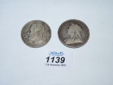 Two silver coins : Queen Victoria 1893 and Leopold II 1873.
