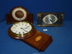 A 'Garside Williams of Snowdonia' wall clock with Roman numerals,