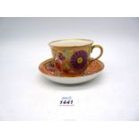 A circa 1800 Chamberlain Worcester large cup and saucer with all over hand painted decoration of