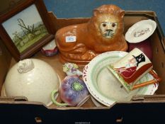 A quantity of china including mantle lion, pottery cheese dome with mouse finial and wooden base,