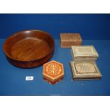 A large wooden fruit bowl, 12" diameter x 3 1/2" high and four inlaid boxes including a spice box.